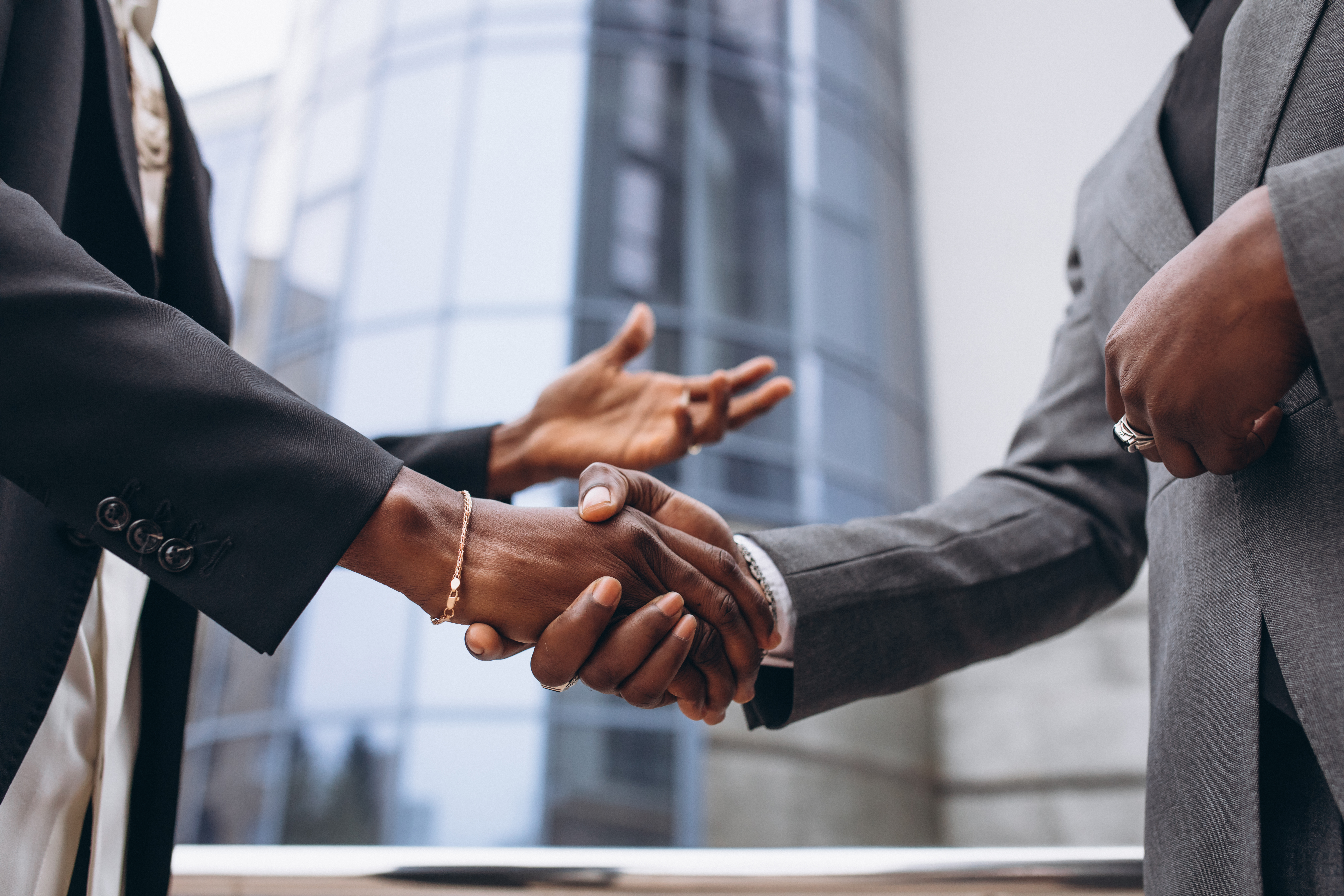 Hand shake between african men.